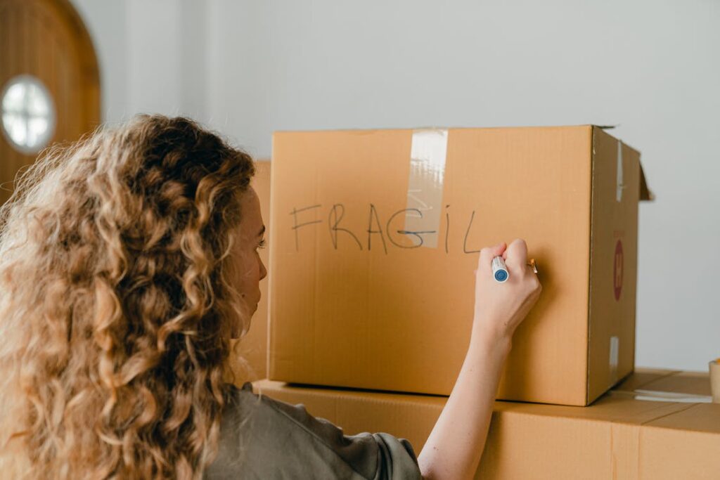 woman labeling boxes