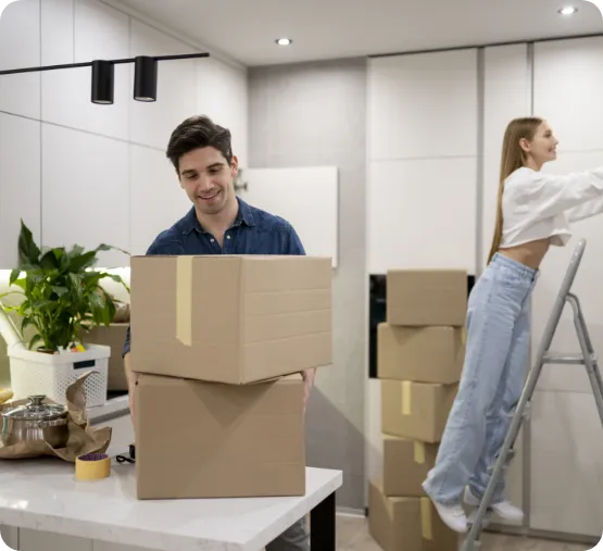 man and woman arranging living space
